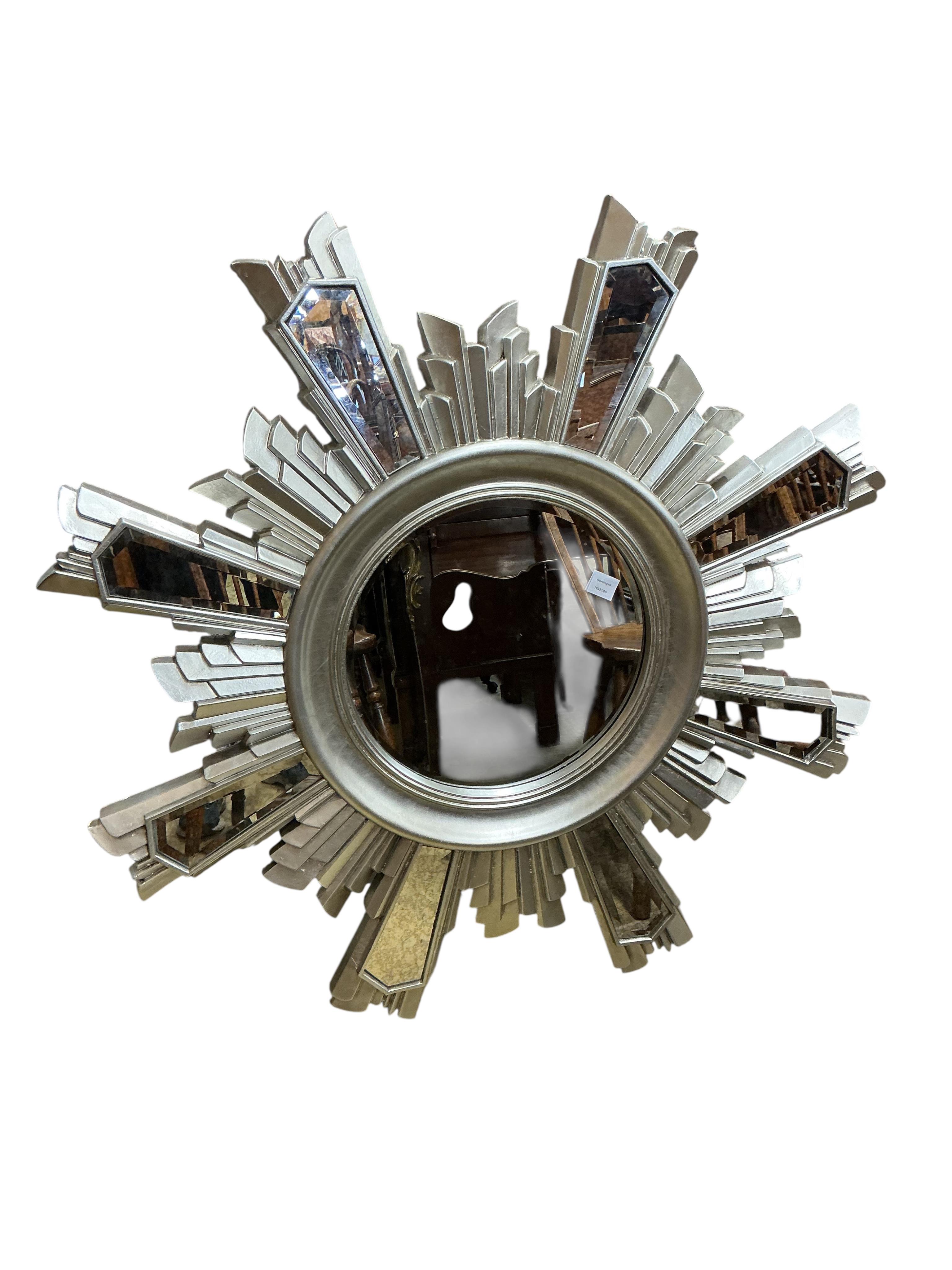 A Contemporary silvered sunburst wall mirror, diameter 116cm